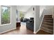 Comfortable living room featuring plush seating, hardwood floors, and lots of natural light at 301 Parkaire Xing, Marietta, GA 30068