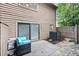 Cozy patio area with outdoor seating, and a sliding door providing seamless indoor-outdoor living at 301 Parkaire Xing, Marietta, GA 30068