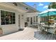 Spacious outdoor deck with seating and an umbrella, perfect for entertaining or relaxing outdoors at 4875 Rivercliff Sw Trce, Lilburn, GA 30047