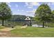 Scenic view of lake with gazebo and grassy area perfect for picnics and relaxation at 606 Lorimore Pass, Canton, GA 30115