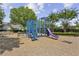 Community playground area with play equipment and wood chip ground covering at 606 Lorimore Pass, Canton, GA 30115