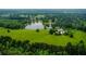 Home is situated on expansive acreage with a lake in a beautiful wooded area at 1415 N Flat Rock Rd, Douglasville, GA 30134