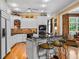 Modern kitchen with white cabinets, black countertops, and stainless steel appliances at 1415 N Flat Rock Rd, Douglasville, GA 30134