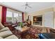 Comfortable living room with ample seating, fireplace, and natural light at 1415 N Flat Rock Rd, Douglasville, GA 30134