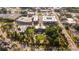 Expansive aerial view of a town featuring well-maintained landscaping, buildings, and roads at 385 Rowes Cir, Alpharetta, GA 30009