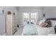 Cozy bedroom with natural light, plush bedding, and stylish furnishings creating a relaxing atmosphere at 385 Rowes Cir, Alpharetta, GA 30009