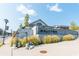 View of the Halcyon mixed-use community entrance, featuring landscaping and signage at 385 Rowes Cir, Alpharetta, GA 30009