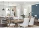 Beautiful kitchen with a large island, stainless steel appliances, and plenty of natural light at 385 Rowes Cir, Alpharetta, GA 30009