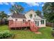 The backyard features a deck, stairs, and grass area, perfect for outdoor living at 6177 Idlewood Cir, Lithonia, GA 30038