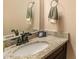 Bathroom with granite countertops and modern fixtures at 6177 Idlewood Cir, Lithonia, GA 30038
