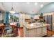 Spacious kitchen with granite countertops, a center island, and stainless steel appliances at 6177 Idlewood Cir, Lithonia, GA 30038