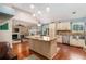 Bright kitchen featuring granite countertops, stainless steel appliances, and ample cabinet space at 6177 Idlewood Cir, Lithonia, GA 30038