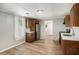 Kitchen featuring wood cabinets, stainless steel appliances, and light countertops at 1186 Eastview Ne Rd, Conyers, GA 30012