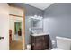 This bathroom is complete with a stylish vanity, mirror, modern lighting, and fixtures at 2839 Orion Dr, Decatur, GA 30033
