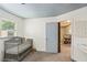 Bedroom featuring a crib and a doorway to an adjoining room at 2839 Orion Dr, Decatur, GA 30033
