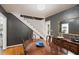 Dining room showcasing hardwood floors and access to the stairway and kitchen at 2839 Orion Dr, Decatur, GA 30033