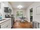 Updated kitchen featuring stainless steel appliances, hardwood floors and eat in area at 2839 Orion Dr, Decatur, GA 30033