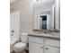 Bathroom features granite countertops and white cabinetry with a bathtub and sink; plenty of space to get ready at 2894 Regent Walk Dr, Duluth, GA 30096