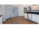 Modern kitchen featuring stainless steel appliances, white cabinets, and granite countertops at 2894 Regent Walk Dr, Duluth, GA 30096