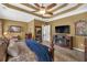 Main bedroom showcasing a tray ceiling, and carpeted floors at 3262 Beech Hollow Ct, Loganville, GA 30052