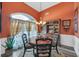 Elegant dining room with wood table, chairs, and hutch at 3262 Beech Hollow Ct, Loganville, GA 30052