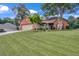 Charming single-story home with a well-manicured lawn and mature landscaping, offering great curb appeal at 3262 Beech Hollow Ct, Loganville, GA 30052