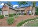 Well maintained front yard featuring a brick house with a 2 car garage at 3262 Beech Hollow Ct, Loganville, GA 30052