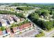 Aerial view of businesses near residential homes and wooded areas at 4824 Sultana Sw Way, Atlanta, GA 30331