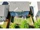 Aerial view of a large home with a spacious green backyard and wooden fence at 4824 Sultana Sw Way, Atlanta, GA 30331