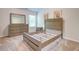 Bedroom with empty wooden frame, dresser, and mirror at 4824 Sultana Sw Way, Atlanta, GA 30331