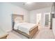 Comfortable bedroom features a neutral color palette and ample natural light at 4824 Sultana Sw Way, Atlanta, GA 30331