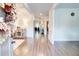 Inviting entryway with light wood floors, decorative accents, and an open view of the home at 4824 Sultana Sw Way, Atlanta, GA 30331