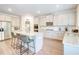 Well-equipped kitchen with stainless steel appliances, granite countertops, and a central island with bar stool seating at 4824 Sultana Sw Way, Atlanta, GA 30331