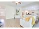 Open-concept living room merges seamlessly with the kitchen and dining area, perfect for modern living at 4824 Sultana Sw Way, Atlanta, GA 30331