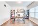 Bright office featuring built-in bookshelves, an elegant desk, and lots of natural light at 4824 Sultana Sw Way, Atlanta, GA 30331