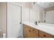 Well-lit bathroom with white countertop vanity, and tile shower at 1028 Constitution Way, Cumming, GA 30040