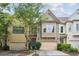 Inviting townhome with attached garage and well-maintained landscaping for great curb appeal at 1028 Constitution Way, Cumming, GA 30040