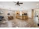 Open concept living area with kitchen, dining and counter seating at 1028 Constitution Way, Cumming, GA 30040