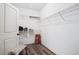 Spacious walk-in closet with ample shelving and storage solutions with room for a stool at 1028 Constitution Way, Cumming, GA 30040