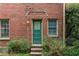 Brick exterior featuring a back door at 1080 Clifton Ne Rd, Atlanta, GA 30307