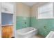 Bathroom with tiled walls and view of bedroom at 1080 Clifton Ne Rd, Atlanta, GA 30307
