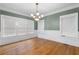 Inviting dining room featuring hardwood floors, a chandelier, and ample natural light at 1080 Clifton Ne Rd, Atlanta, GA 30307