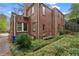 Exterior of a home featuring a well manicured yard at 1080 Clifton Ne Rd, Atlanta, GA 30307
