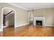 Spacious living room with hardwood floors, fireplace, and staircase at 1080 Clifton Ne Rd, Atlanta, GA 30307