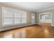 Bright living room featuring hardwood floors, large windows, and classic trim at 1080 Clifton Ne Rd, Atlanta, GA 30307