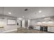 Finished basement features concrete floors, work area, and a stairwell at 1338 Iverson Ne St, Atlanta, GA 30307