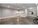 Large basement featuring gray walls, concrete floors, and a wash basin at 1338 Iverson Ne St, Atlanta, GA 30307