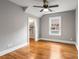 Bedroom featuring wood floors, neutral walls and a view of the back yard at 1338 Iverson Ne St, Atlanta, GA 30307