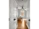 Bedroom with a ceiling fan, wood floors, and a bright window at 1338 Iverson Ne St, Atlanta, GA 30307
