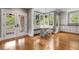 Kitchen nook features dining table, bench seating, hardwood floors and lots of natural light at 1338 Iverson Ne St, Atlanta, GA 30307